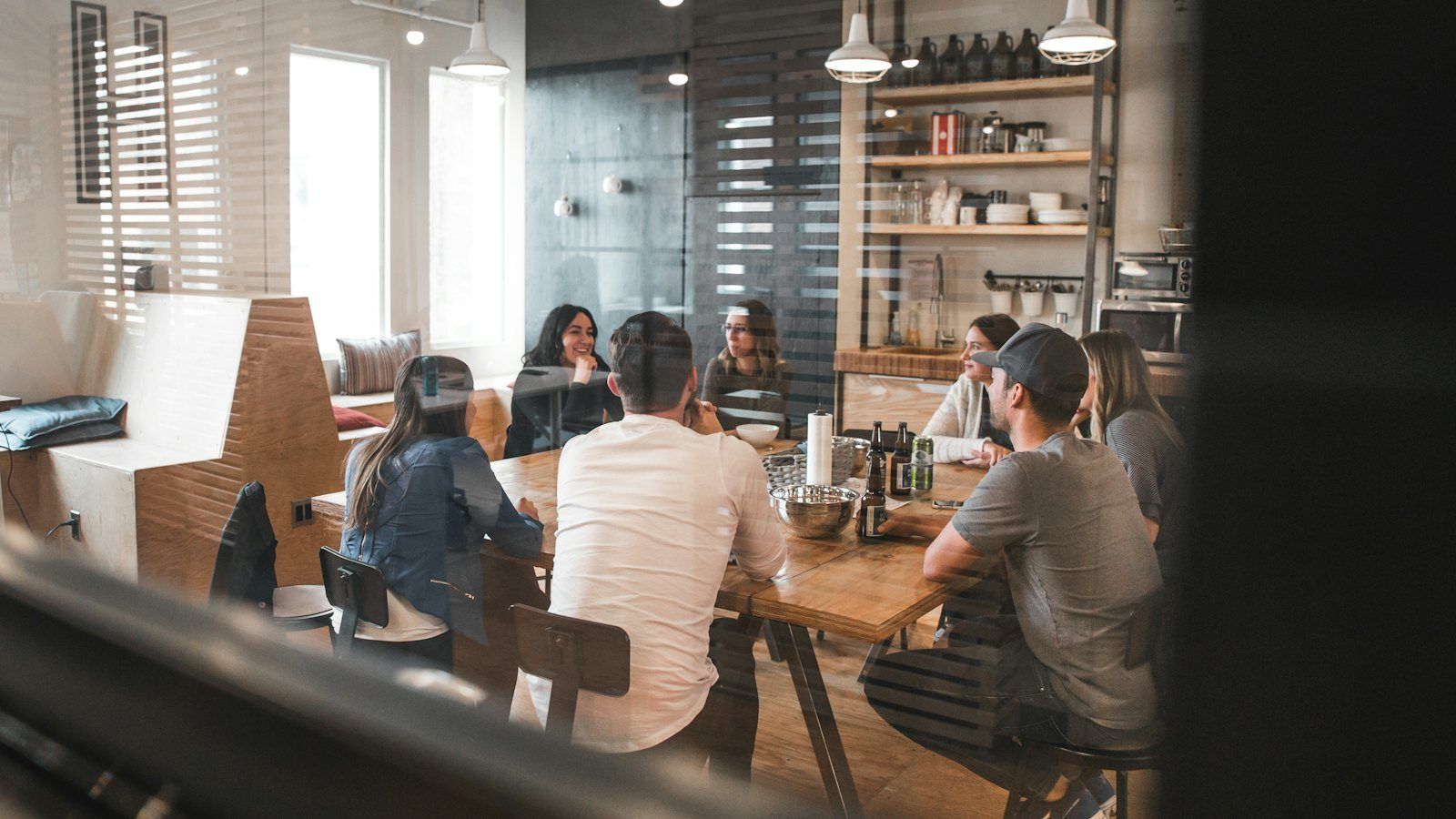 A team talking around a table in the office
